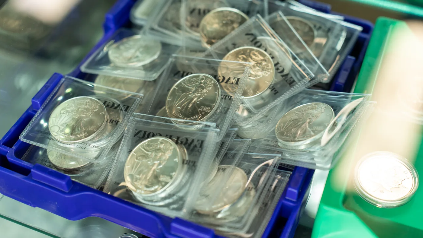 American Silver Eagle coins in plastic trays